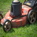 Mag je een grasmaaier op een opgerolde kabelhaspel van 25 meter gebruiken?